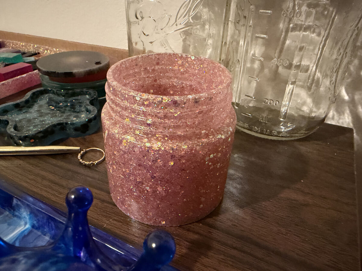 Pink resin jar with suspended glitter